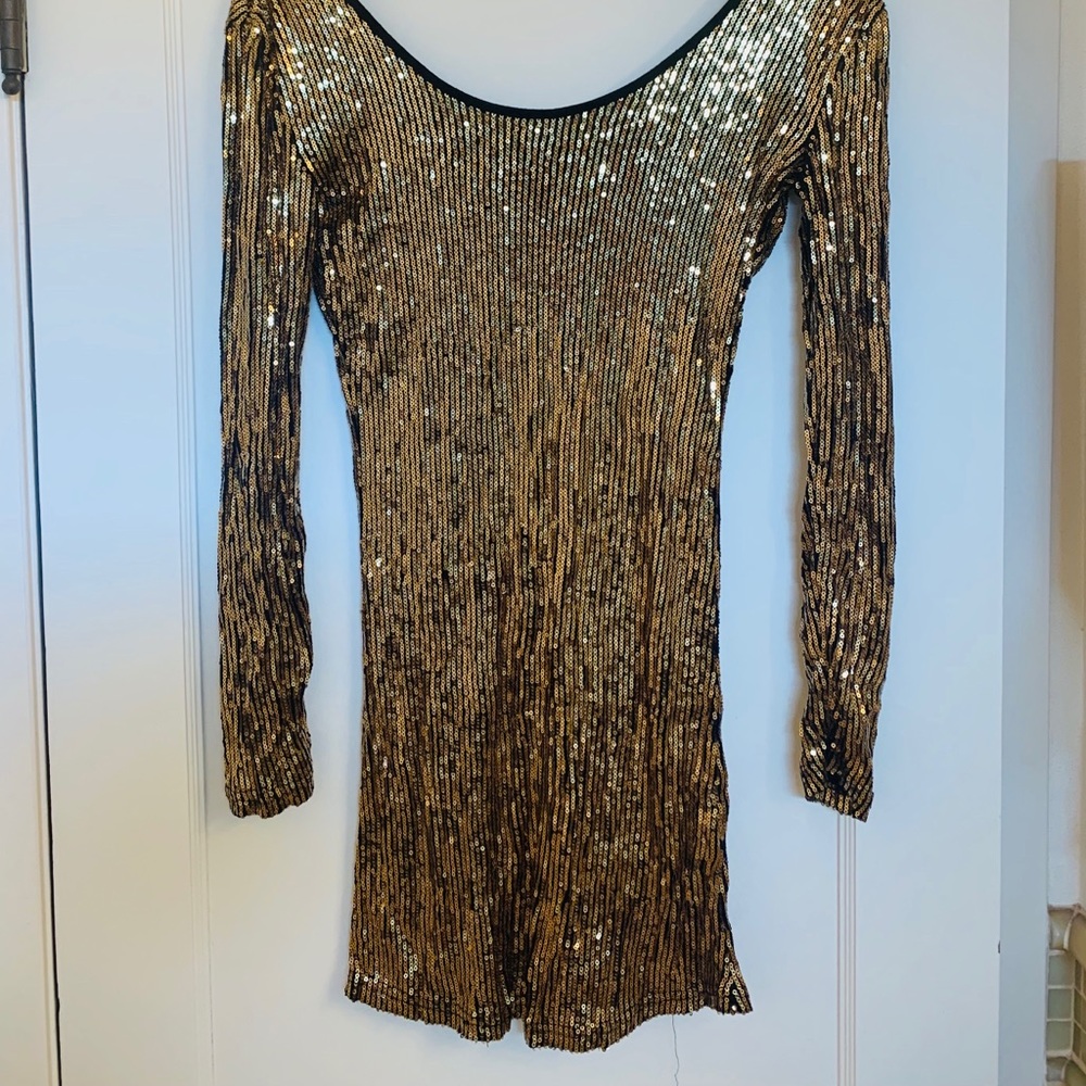 Women’s gold sequin dress